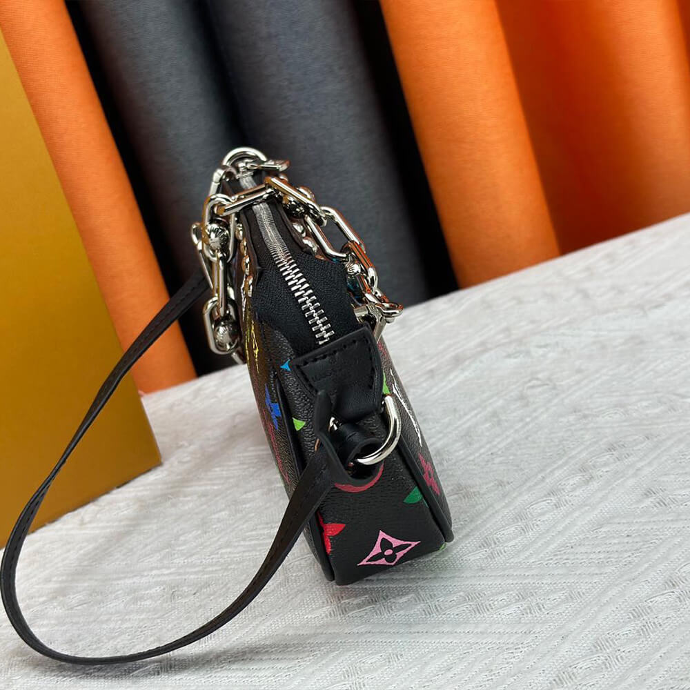 LV x TM POCHETTE ACCESSOIRES