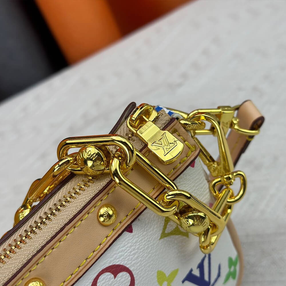 LV x TM POCHETTE ACCESSOIRES