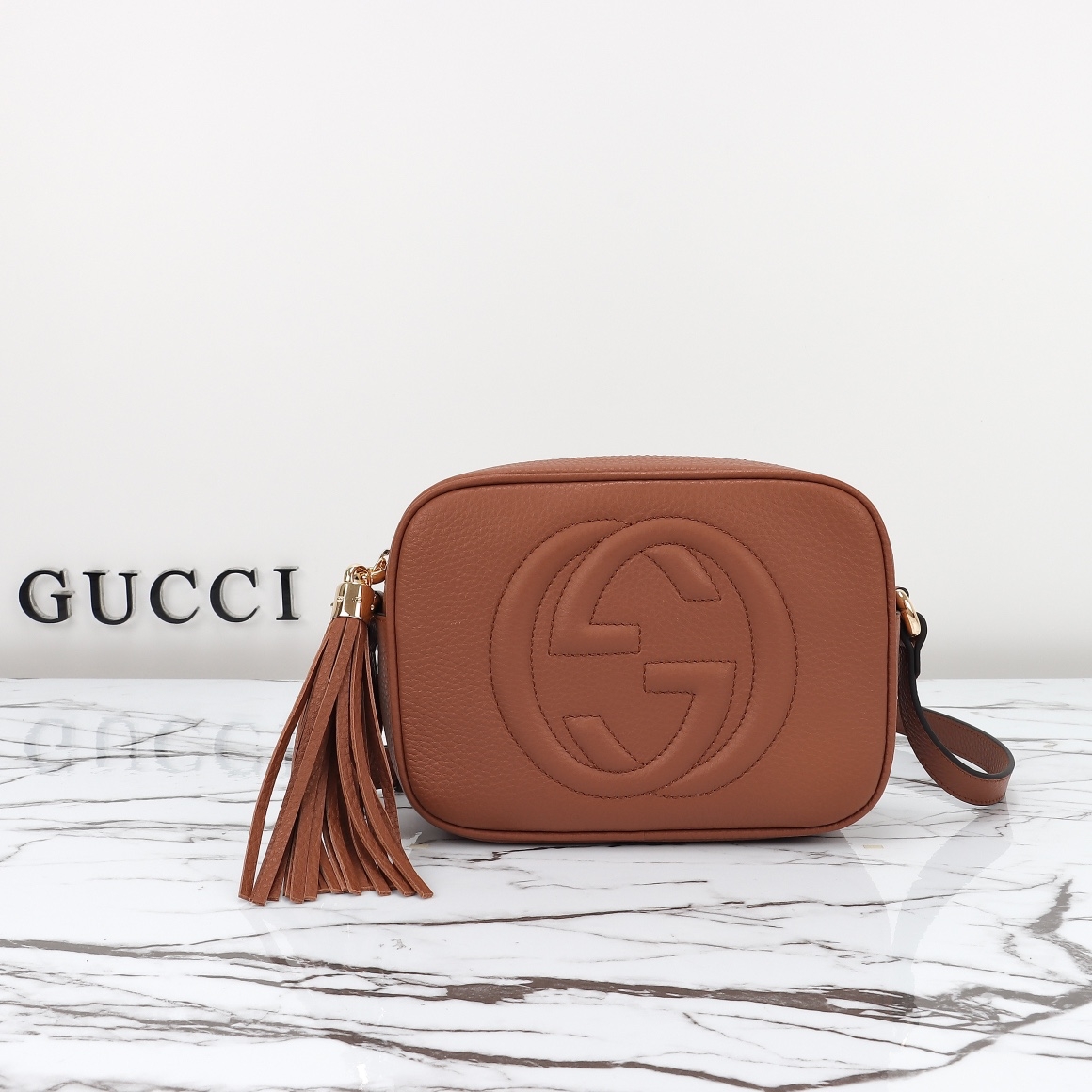 GG Pebbled Calfskin Small Soho Disco Bag