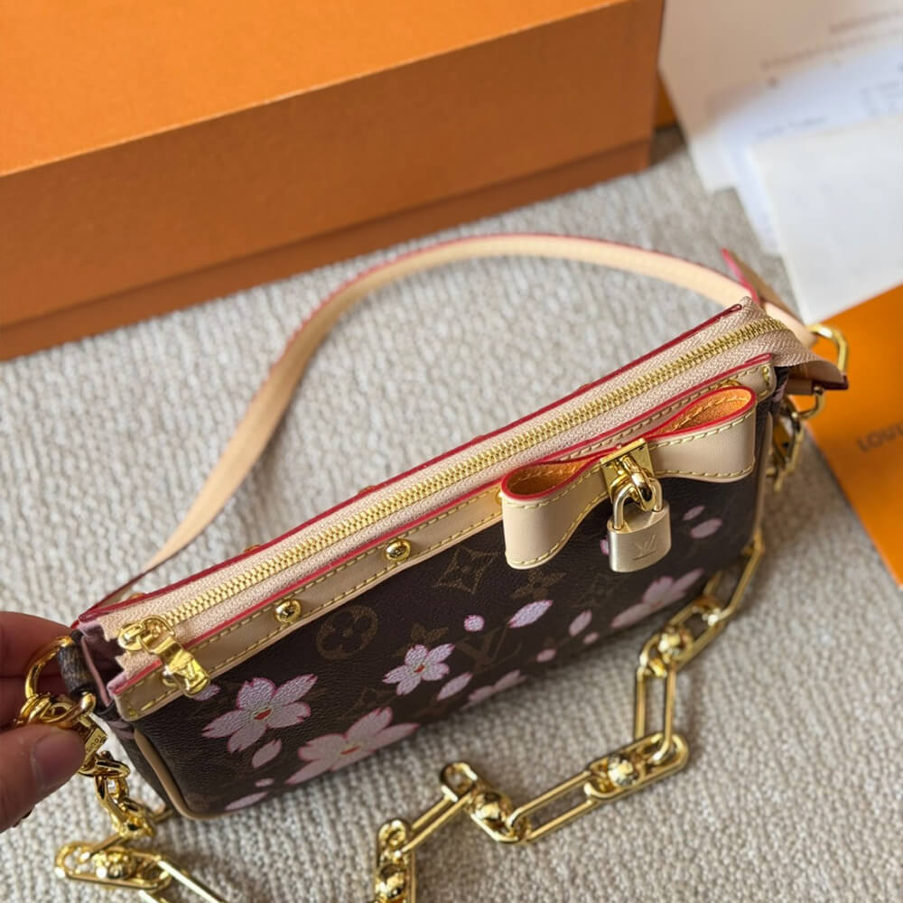 LV x TM POCHETTE ACCESSOIRES