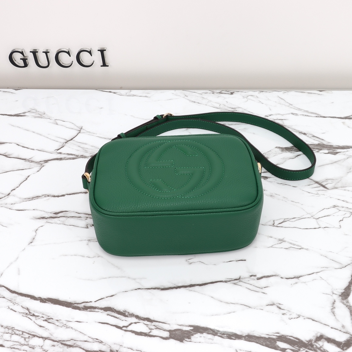 GG Pebbled Calfskin Small Soho Disco Bag