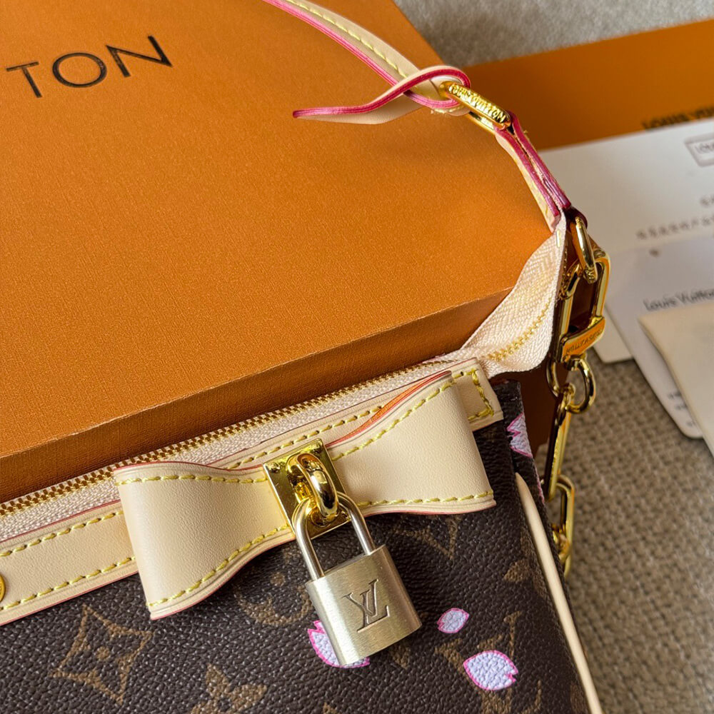 LV x TM POCHETTE ACCESSOIRES