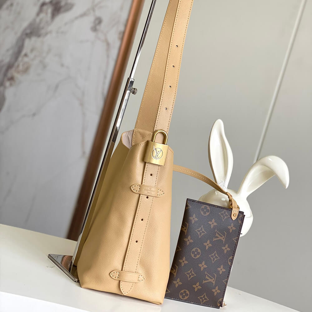 LV LOW KEY HOBO SMALL BAG