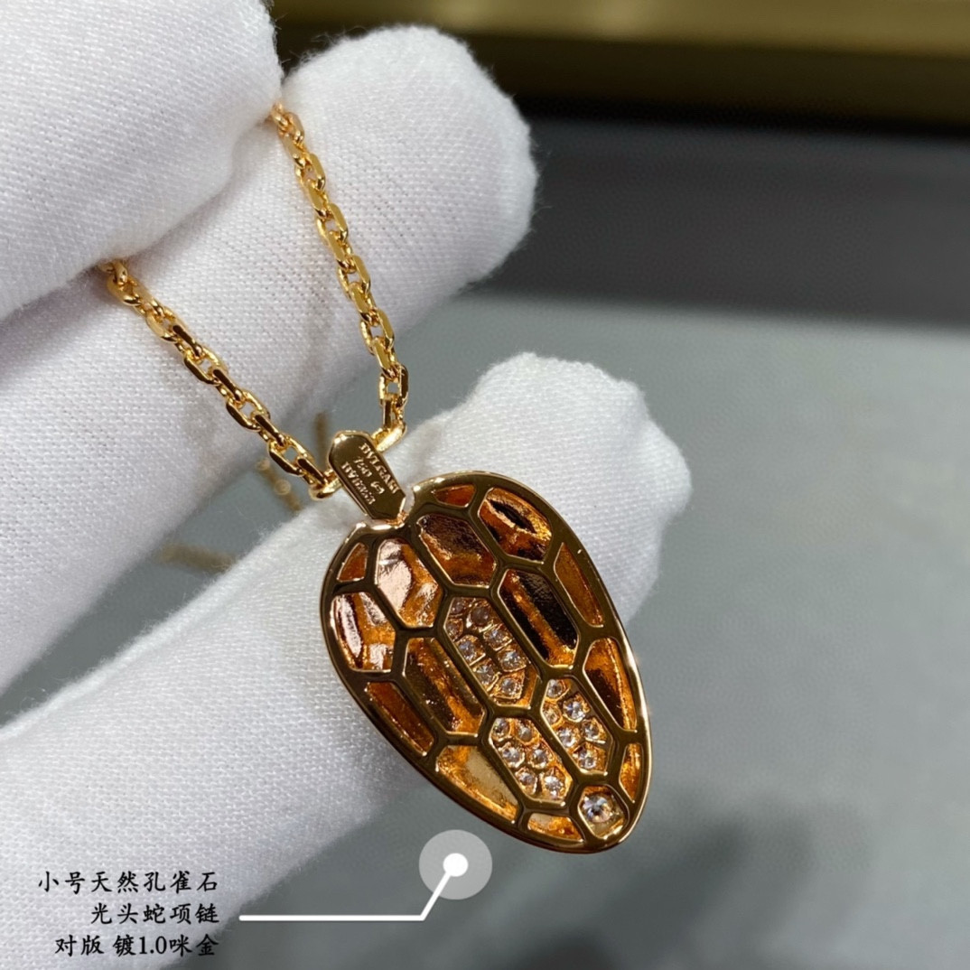 B*l*ai small bald snake necklace