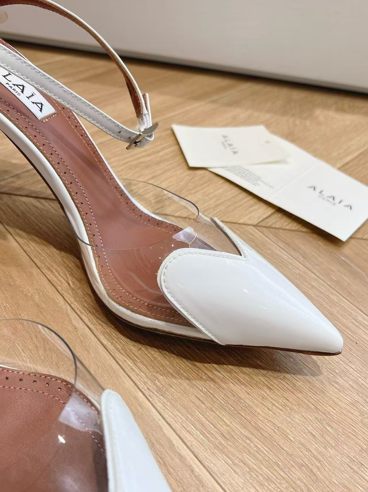UA ALAÏA Patent Heart-Toe Stiletto Pumps