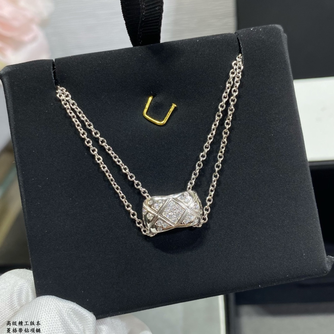 ch*el carved Di*m*nd with Di*m*nd necklace