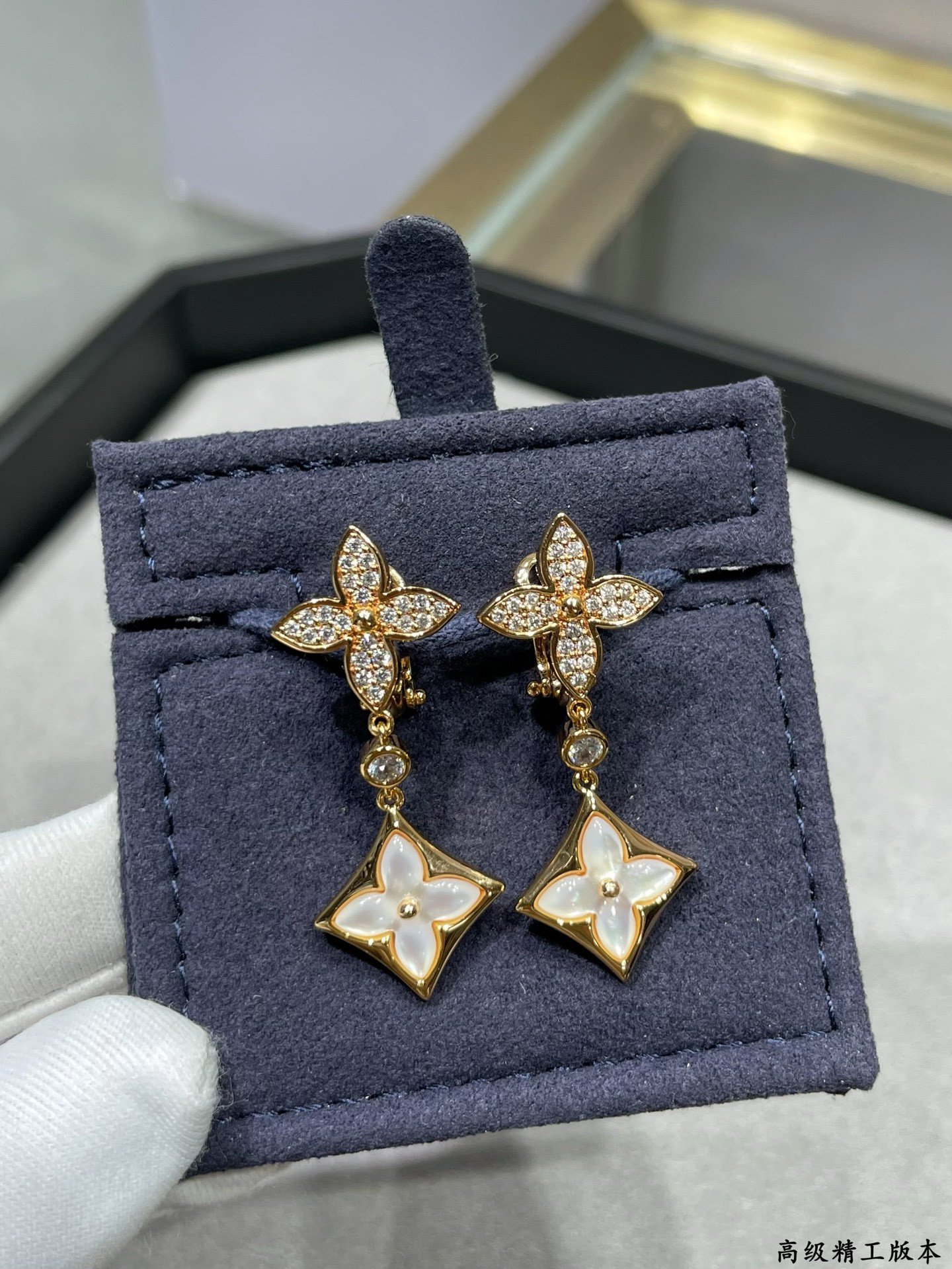 lv two flower Di*m*nd white shell earrings