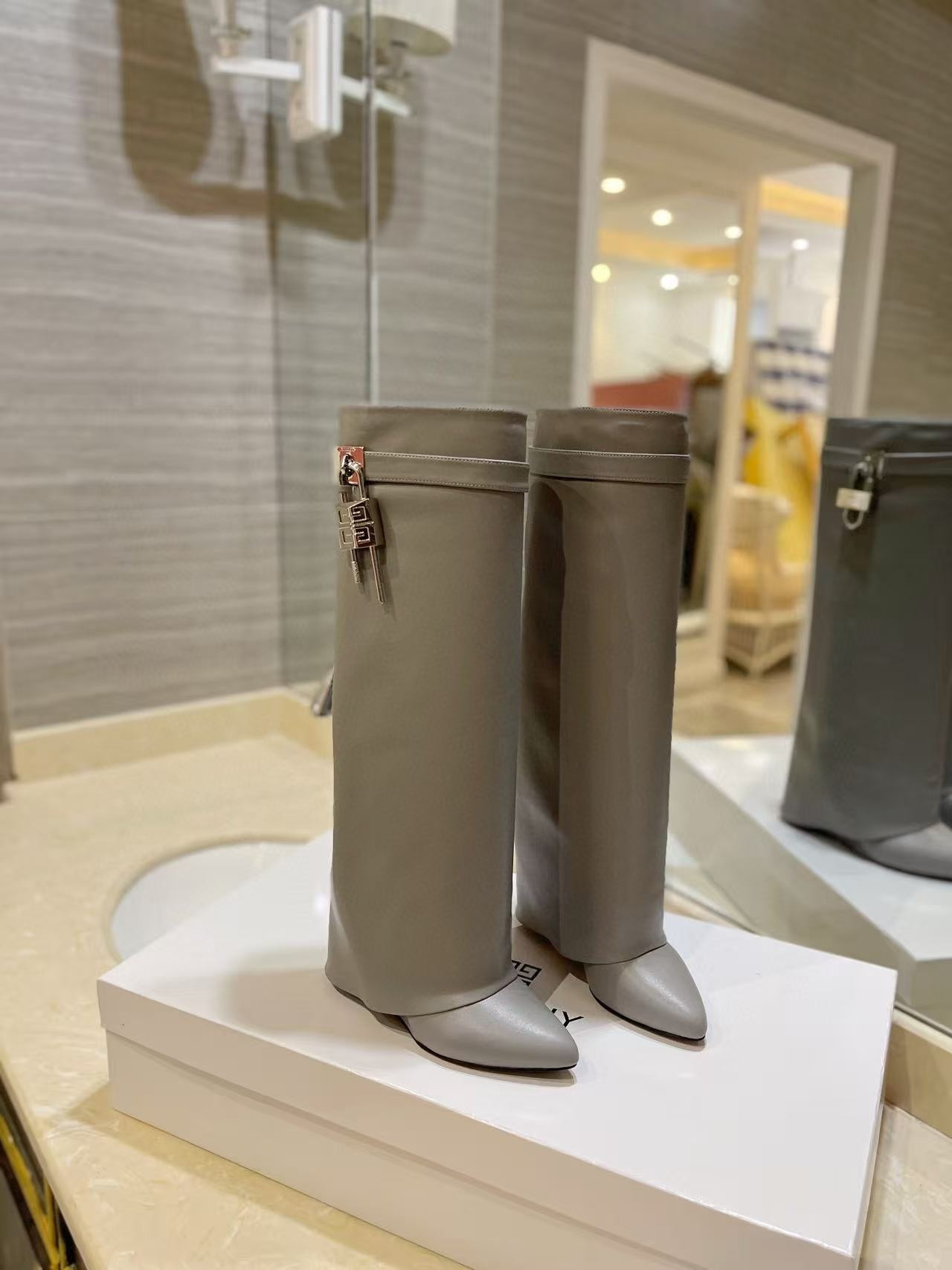 UA Givenchy Shark Lock boots in leather