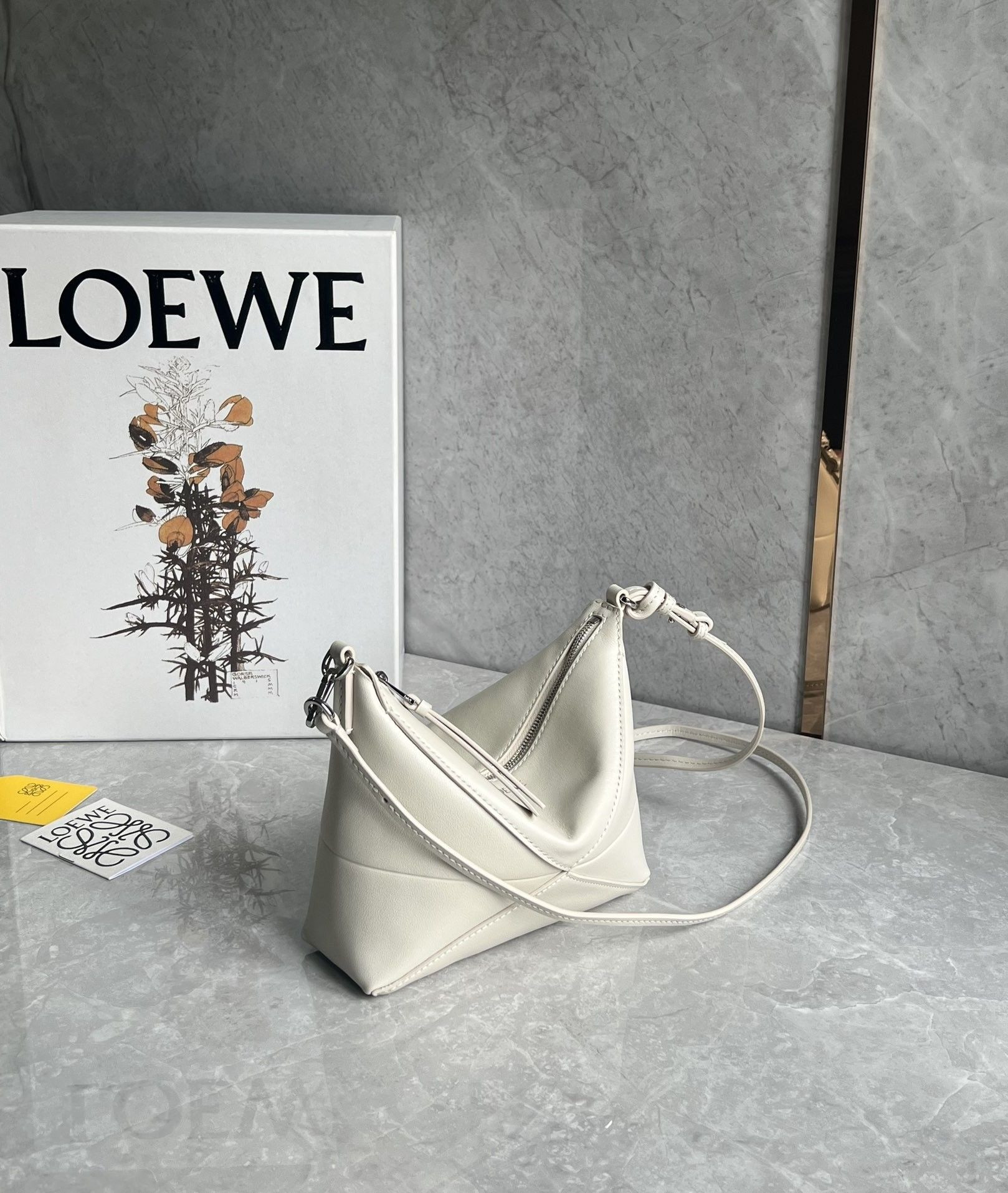 L0ew* puzzle fold pouch in shiny nappa calfskin 15.5x23x6.5cm