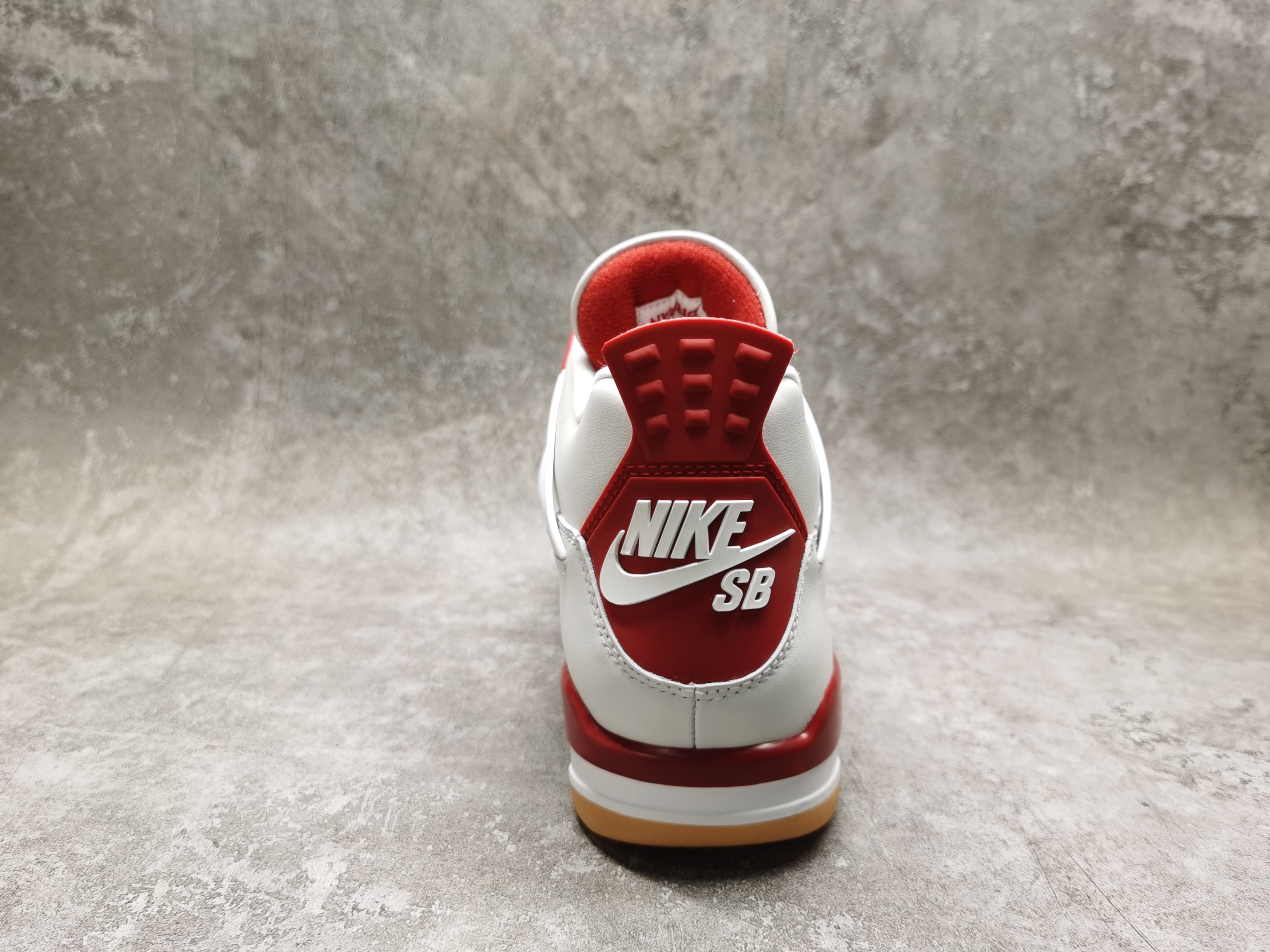 UA Jordan 4 Retro SB