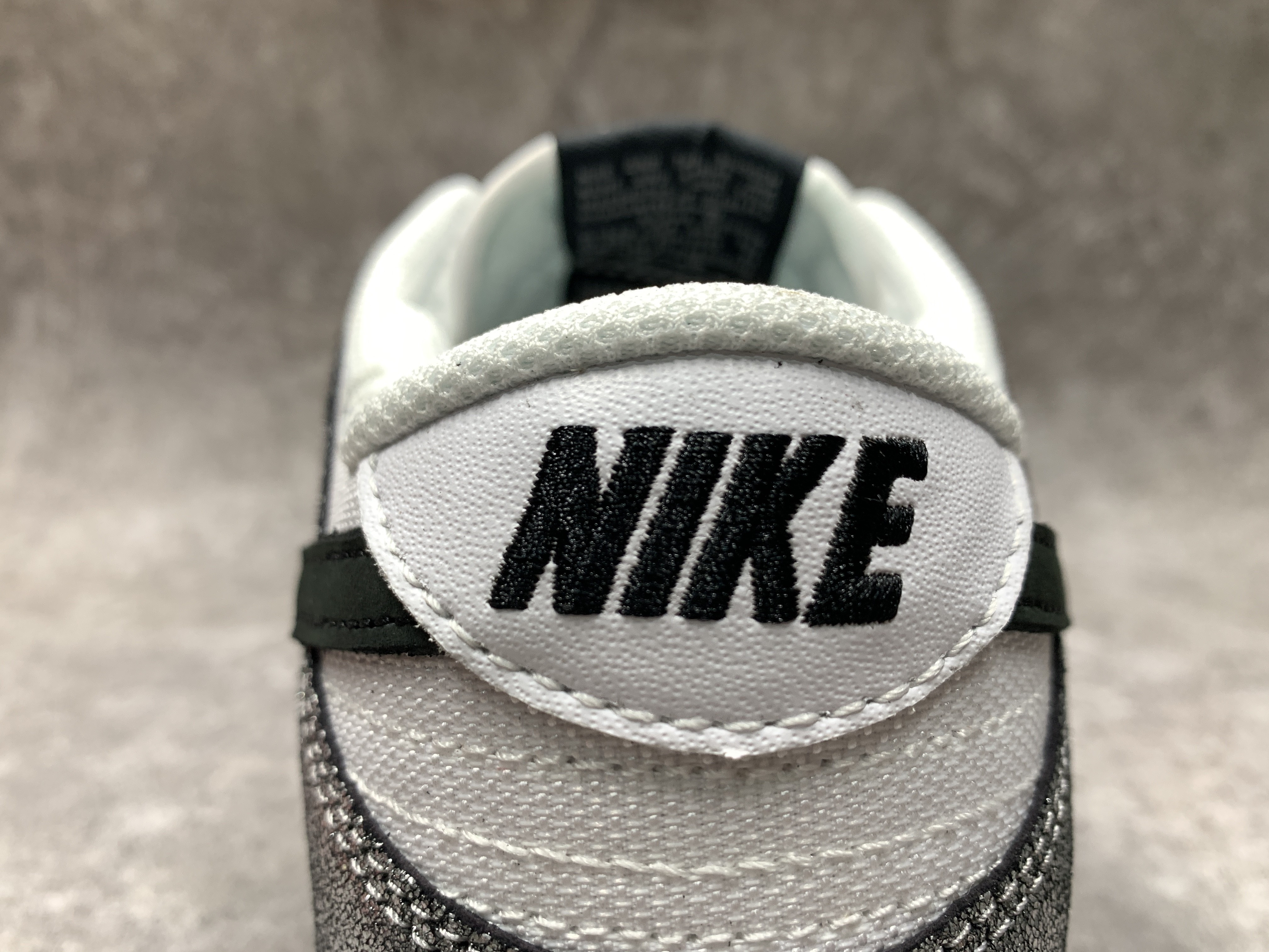 Nike Dunk Low Features Silver Cracked Leather