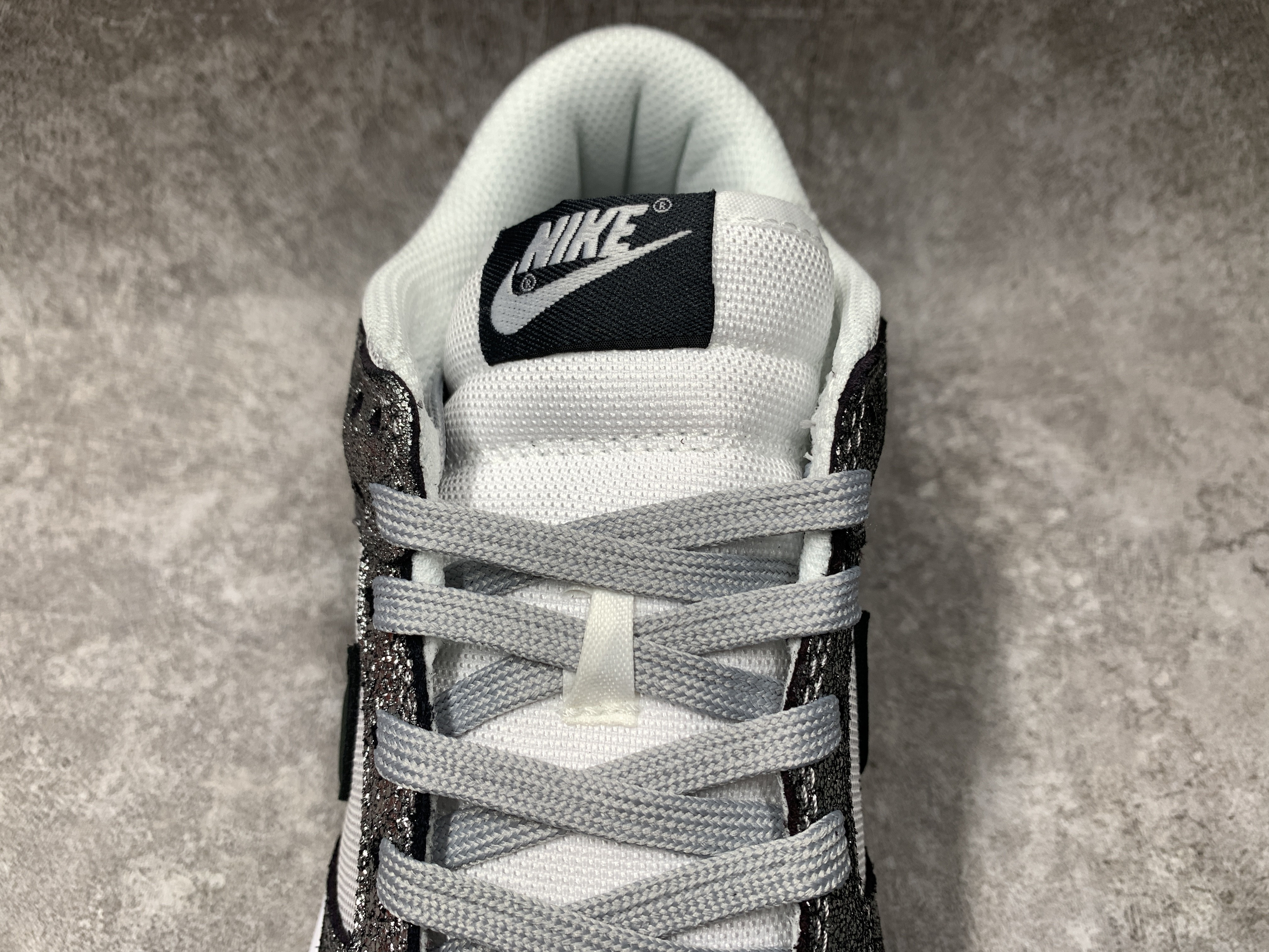 Nike Dunk Low Features Silver Cracked Leather