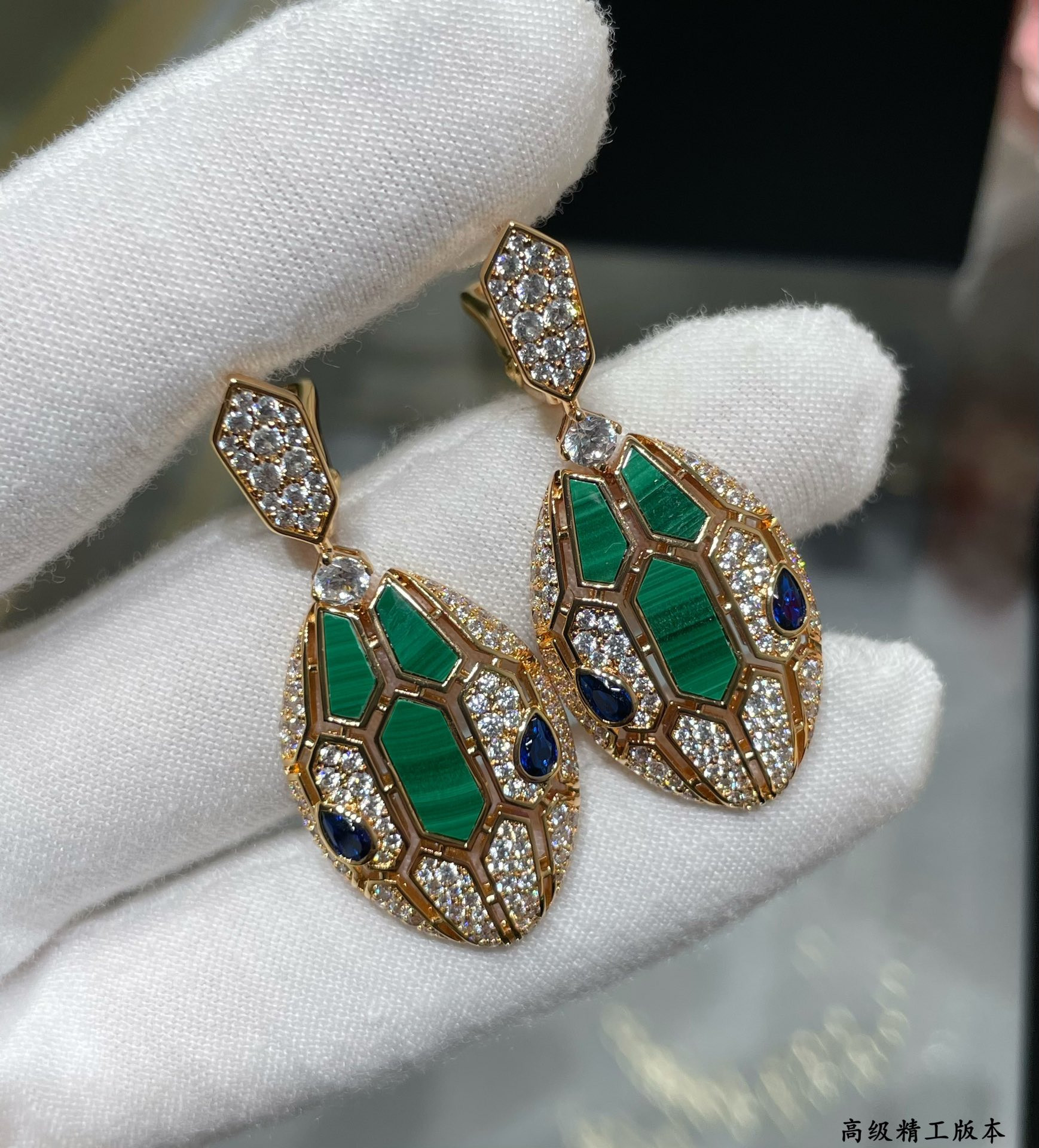 B*l*ai snakes earrings