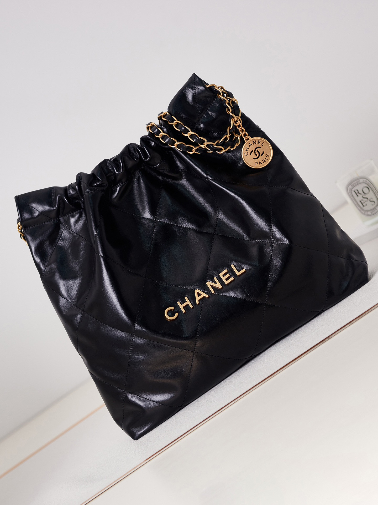 Ch*el 22 handbag shiny calfskin & gold-tone metal black 15.2×16.4×3.1 in