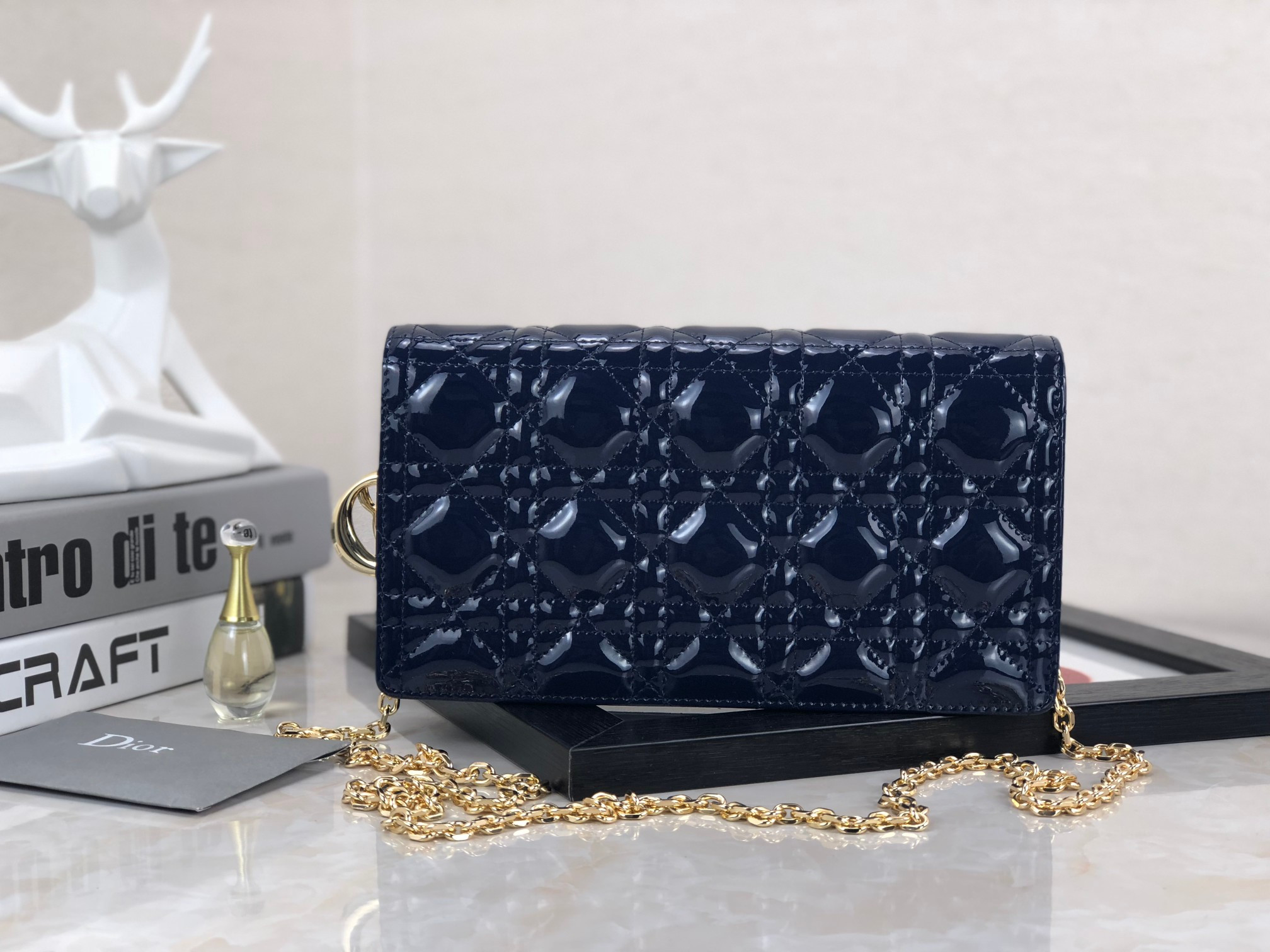 lady D*or pouch  navy patent cannage calfskin 8.5 x 4.5 x 1 inches