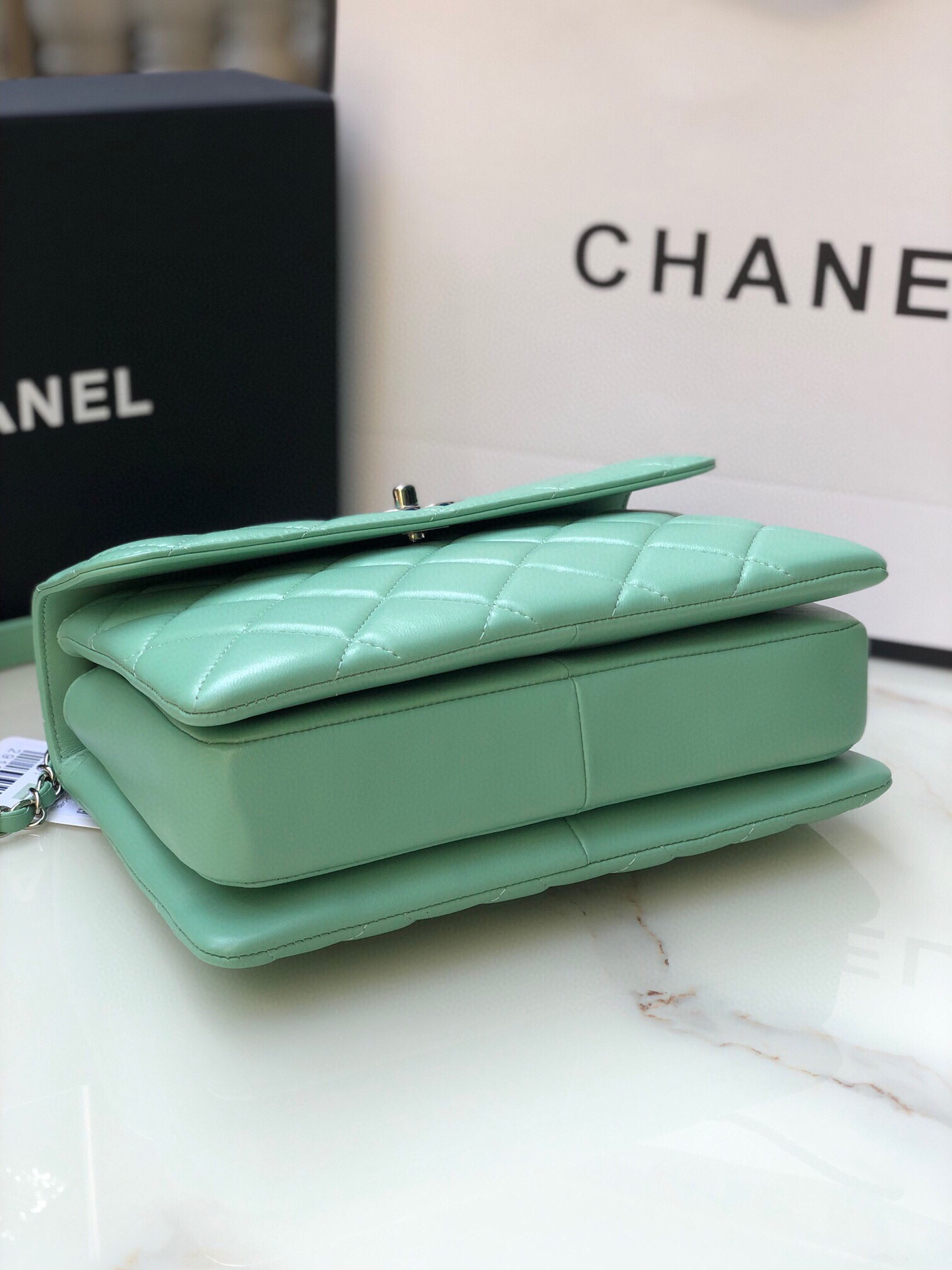 Ch*el flap bag with top handle 6.6 × 9.8 × 4.7 in
