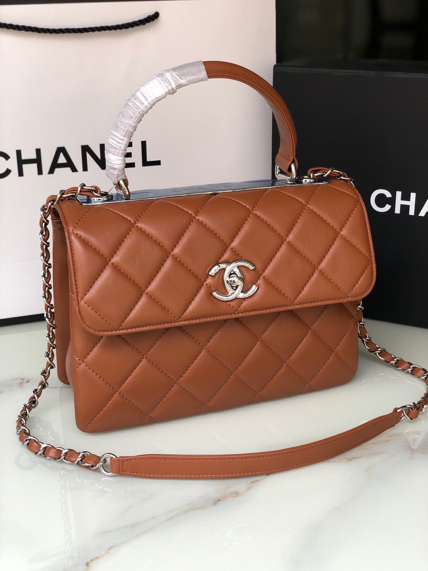 Ch*el flap bag with top handle 6.6 × 9.8 × 4.7 in