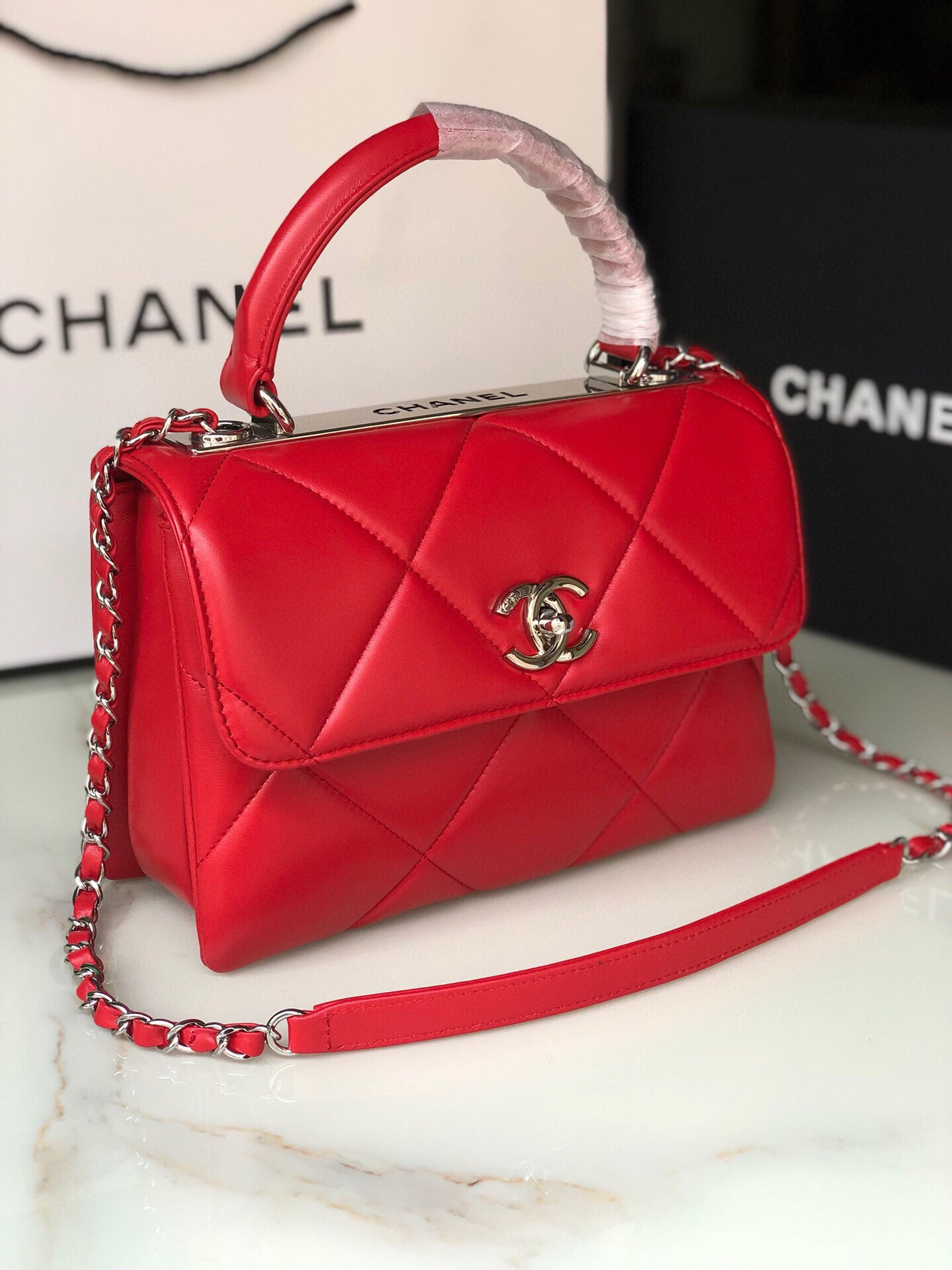 Ch*el flap bag with top handle 6.6 × 9.8 × 4.7 in