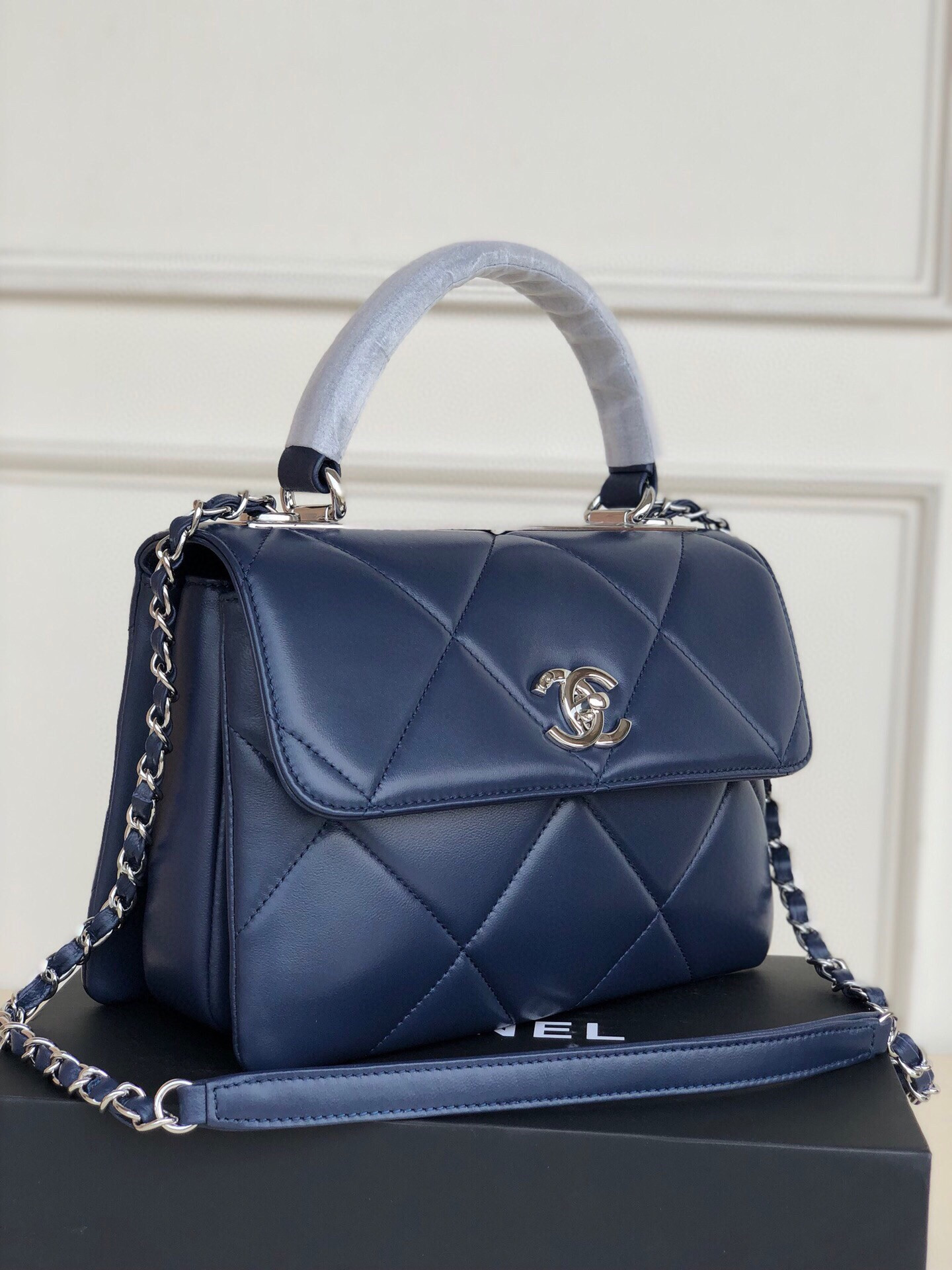Ch*el flap bag with top handle 6.6 × 9.8 × 4.7 in