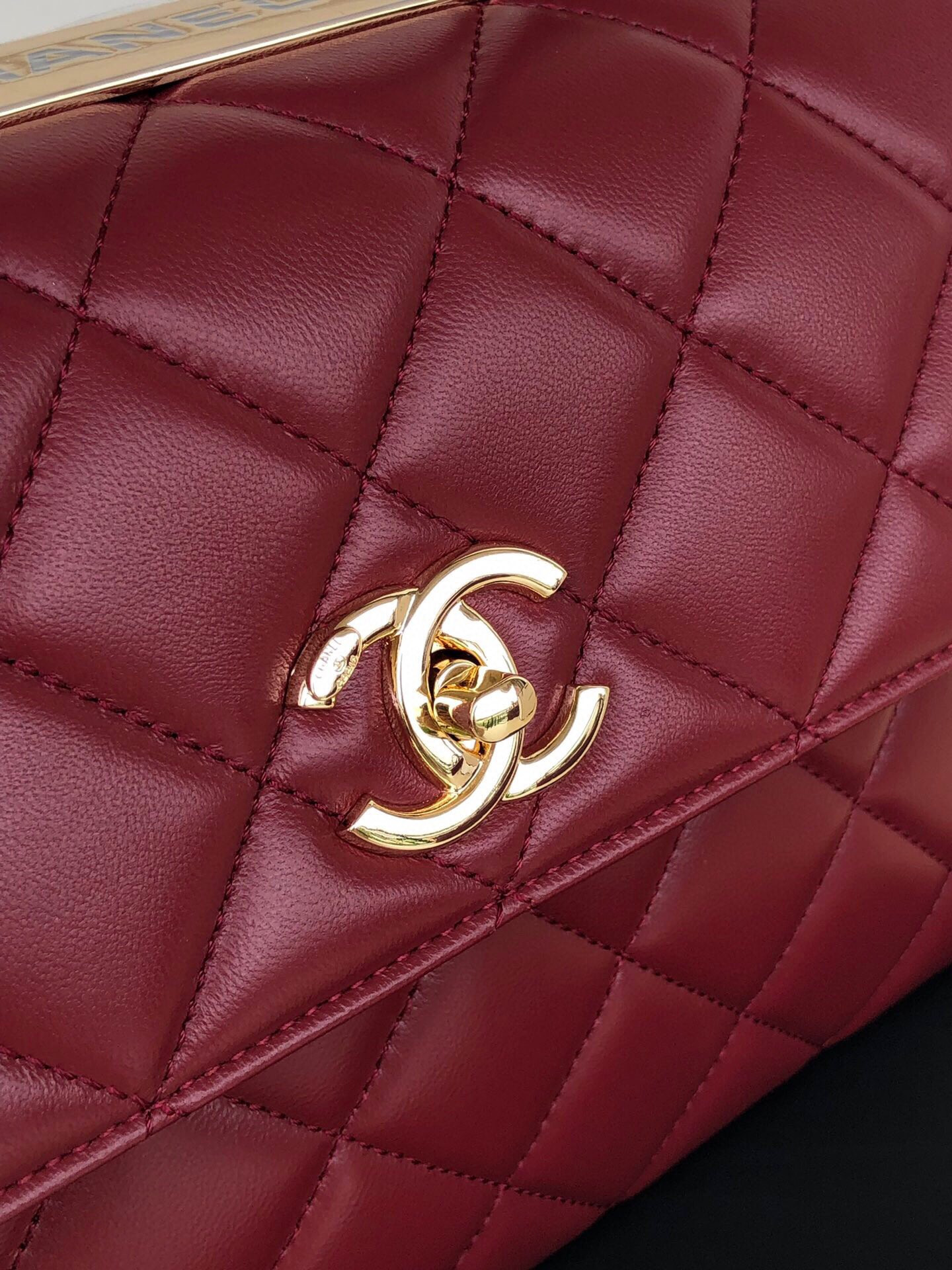 Ch*el flap bag with top handle 6.6 × 9.8 × 4.7 in