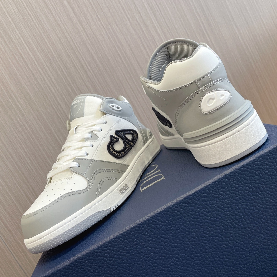 ua D*or b57 mid-top sneaker gray and white