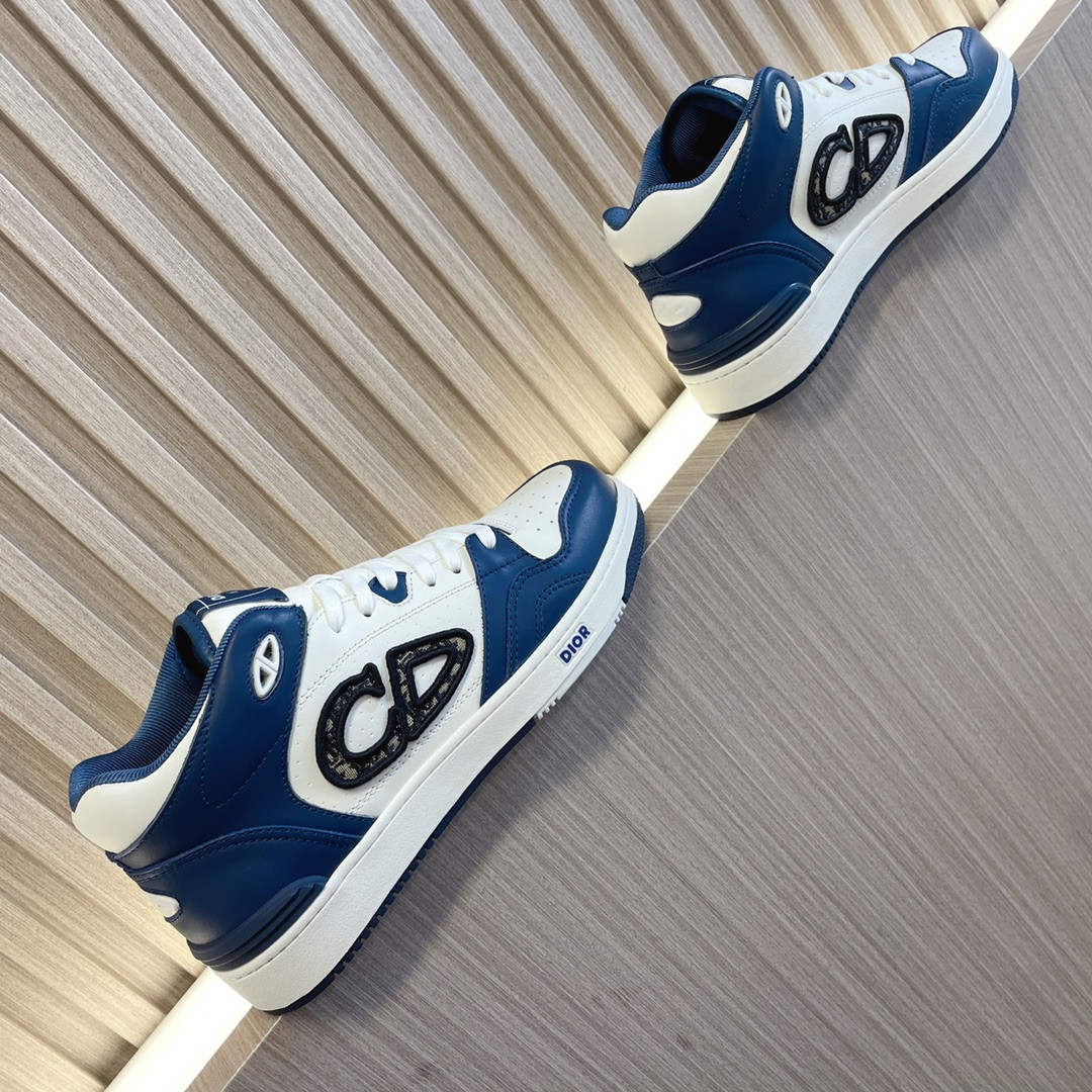 ua D*or b57 mid-top sneaker navy blue and white