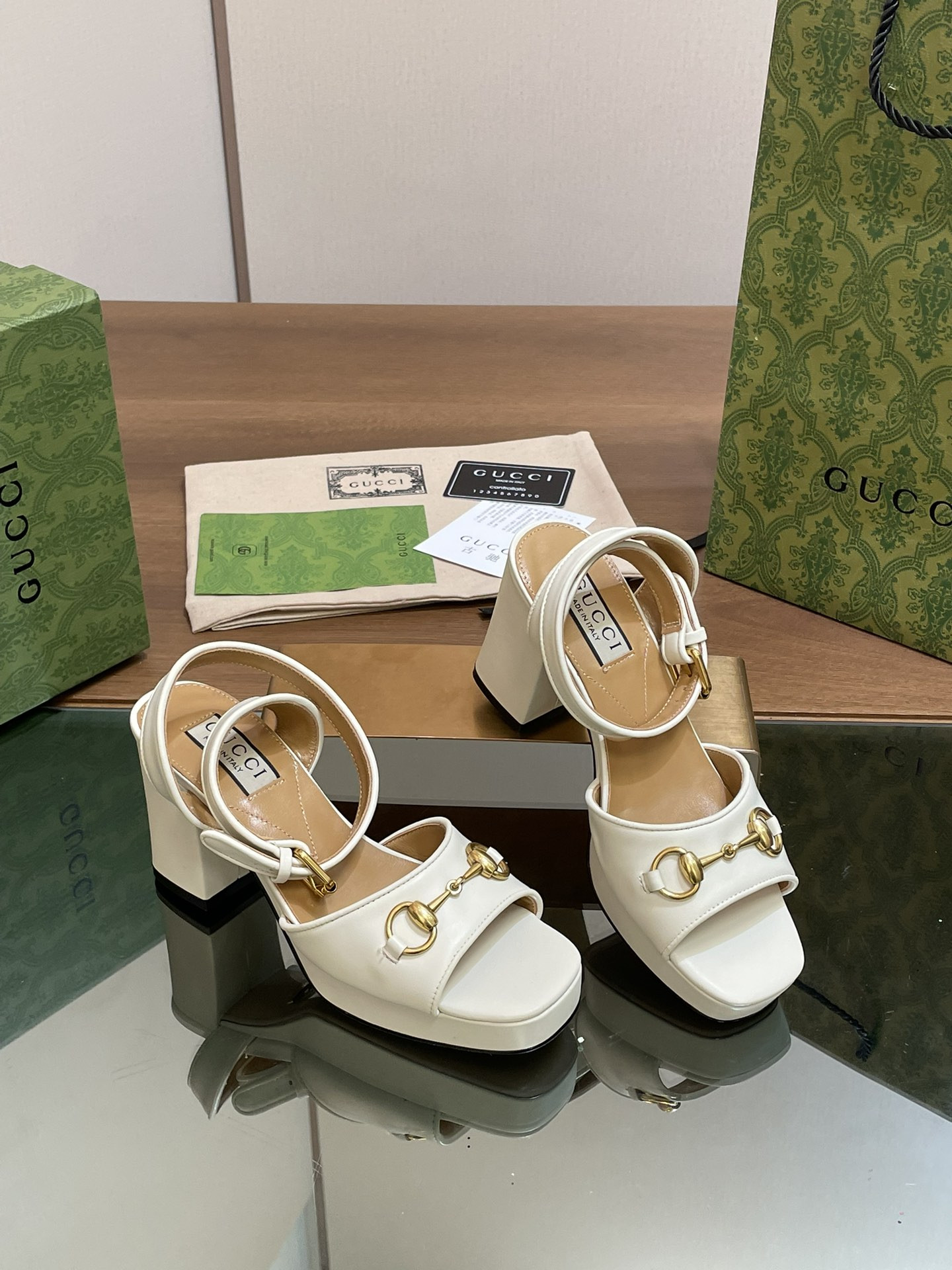 ua G*u*i horsebit platform sandal