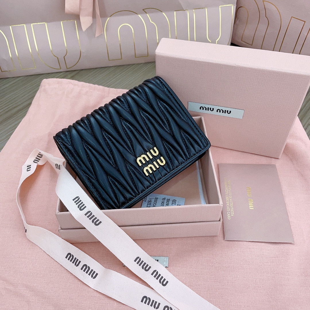 Miu Miu Small matelassé nappa leather wallet 11.2x8.5cm