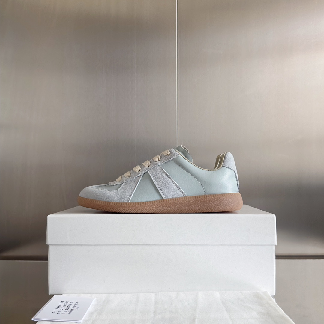 ua ma*s*n Ma*i*la mm6 sneakers