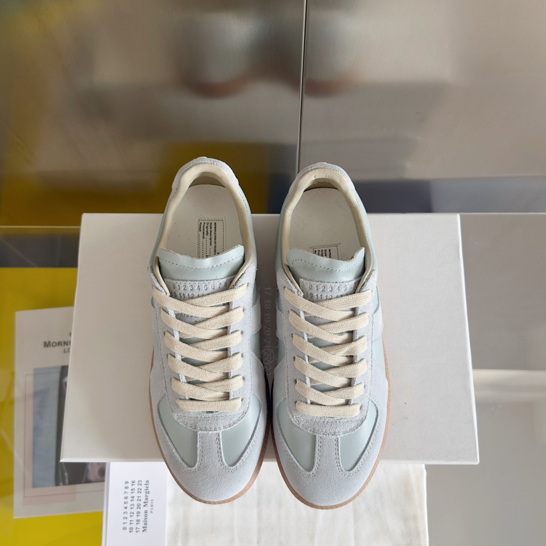 ua ma*s*n Ma*i*la mm6 sneakers