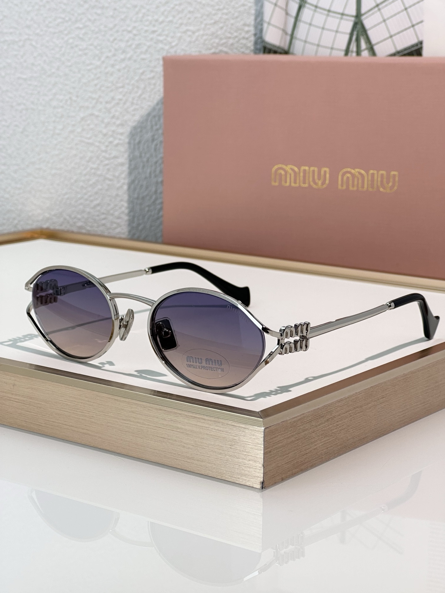 Miu Miu Glasses SMU52Y 54-21-125