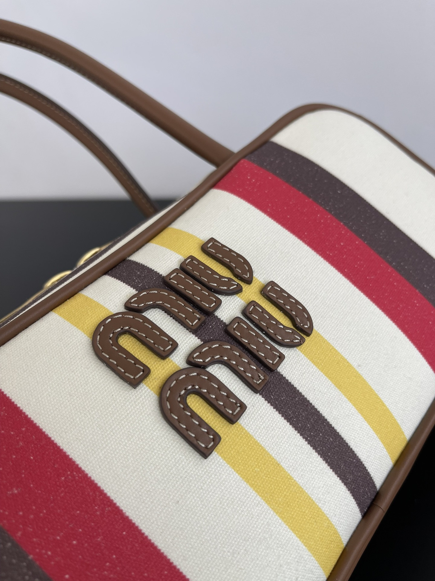 Miu Miu Beau canvas and leather bag 11.5x28x8cm
