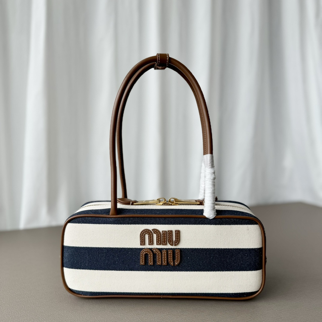 Miu Miu Beau canvas and leather bag 11.5x28x8cm