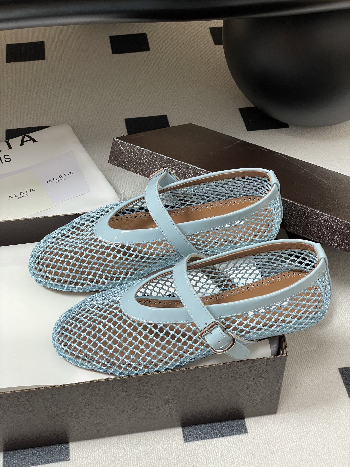 UA ALAÏA BALLET FLATS IN FISHNET